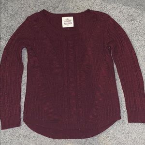 A a knitted sweater.